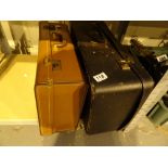 Two vintage suitcases one with fitted interior