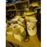 Set of three Kiralpo graduated jugs and two others bearing Victorian registration lozenge and one