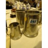 Three pewter tankards two being rugby trophies from 1950