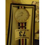 New boxed Daniel Wellington wristwatch rose gold on a fabric strap