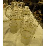 Retro lemonade pitcher and six matching glasses