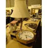 Widdop quartz movement wall clock and a table lamp