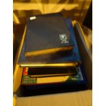 Box of mixed postage stamp albums and related items