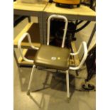 Adjustable height enamelled steel shower seat with padded seat