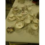 Two bone china tea sets one in a floral pattern and one Green Anne