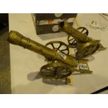 Pair of ornamental brass desk cannons