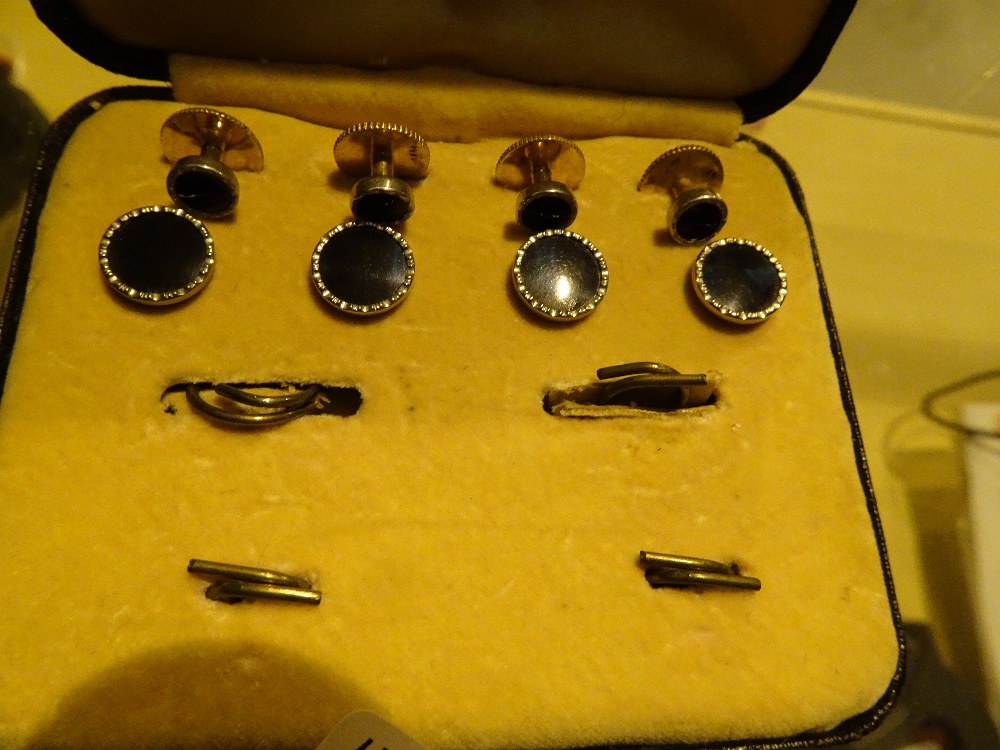 Boxed yellow metal stud set