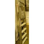 two pairs of aluminium step ladders