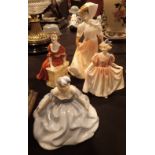 Four Royal Doulton figurines Debutante HN2210 Sweetling HN1935 The Open Road HN4161 and Judith