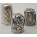 Three hallmarked silver thimbles