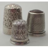 Three hallmarked silver thimbles including Charles Horner