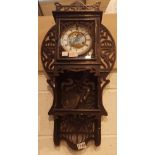 Frett Work wall clock L: 70 cm CONDITION REPORT: This item is working at lotting.