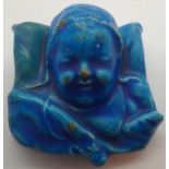 Blue glaze sleeping child head and shoulder figurines