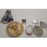 Small group of silver love tokens and a US Airforce reserve medal