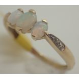9ct gold three stone opal ring with diamond set shoulders size L
