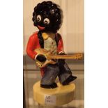 Carlton Ware golly playing the guitar H: 20 cm