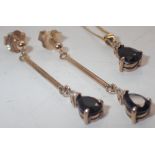 9ct gold fancy pear cut sapphire drop earrings with matching 9ct gold sapphire and diamond pendant