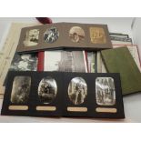 Mixed early photographs in albums