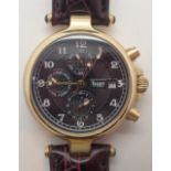 Boxed gold coloured Stauer gents wristwatch with leather strap CONDITION REPORT: