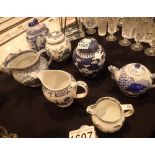 Group of Oriental style blue and white ceramics including ginger jars