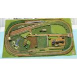 N gauge model train layout set features track building scenery etc on board 76 x 137 cm