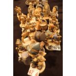 Twelve Hummel and Goebel figurines including rare examples CONDITION REPORT: Girl