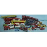 Quantity of Dinky Corgi Matchbox diecast model cars and trucks in need of restoration