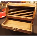 Edwardian oak stationary box with roll top activated by drawer L: 39 cm
