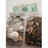 Two tubs of mixed coinage and banknotes