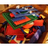 Box of unsorted Lego pieces