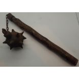 Medieval spiked morning star on chain and later shaft
