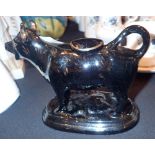 Jackfield ware cow creamer with lid