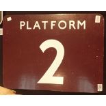 Double sided wooden railway platform sign