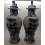 Pair of early Chinese blue and white lidded vases H: 23 cm (excluding lid) A/F CONDITION