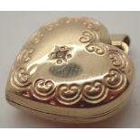 9ct gold heart shaped locket set with diamond and original interior