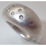 Silver ring with six small diamonds 11.