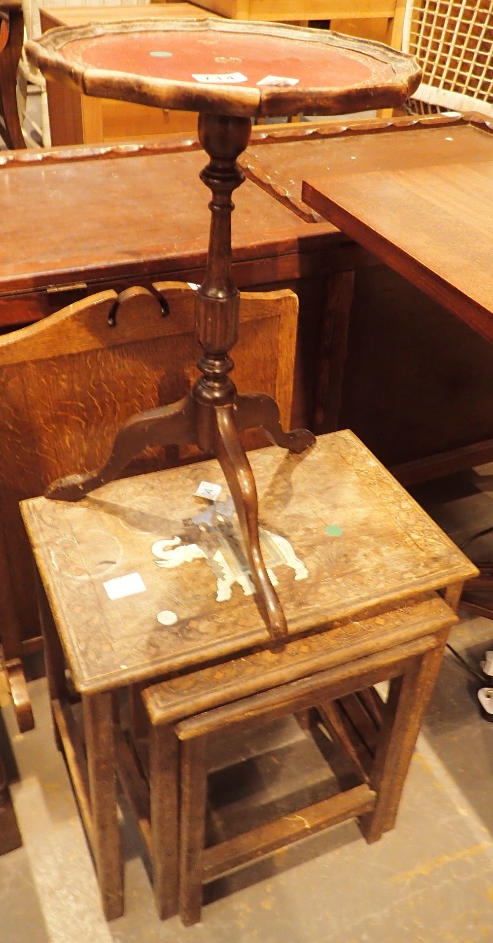 Antique Anglo Indian nest of three tables with inlaid elephant design A/F and a leather top wine