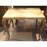Marble topped side table on brass legs