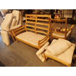 Three piece light wood Ercol suite armchair two seat settee and stool and a further chair