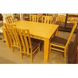 Extending pine rectangular dining table with six matching leather seated chairs