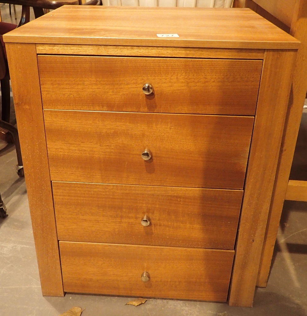 Two sets of three drawers