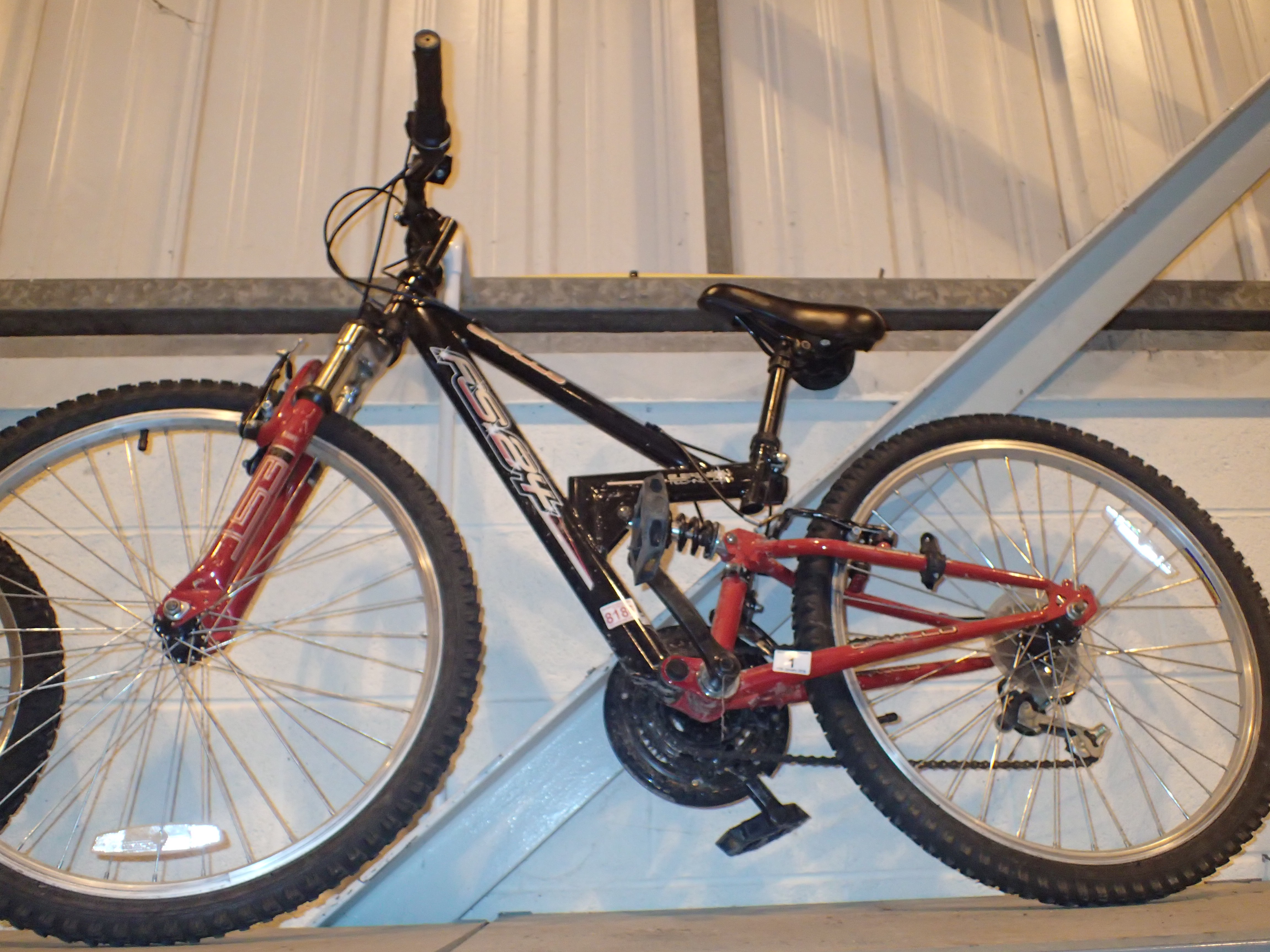 Apollo FS 24 girls mountain bike with front and rear suspension