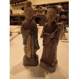 Pair of cast Oriental figurines heads probably reglued