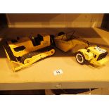 Mini Tonka scraper vehicle and a Tonka bulldozer