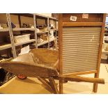 Acme glass washboard and small wooden wheelbarrow