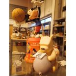 Two Disney figurines Mickey Mouse bath gel and Winnie the Pooh money box