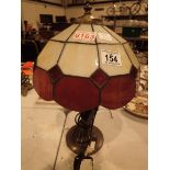 Tiffany style lamp with red and cream shade