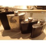 Set of four hipflasks including one fishing related