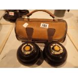 Pair of Thomas Taylor Glasgow bowls with leather carry case