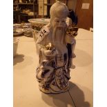 Ceramic figurine of a Chinese gentleman